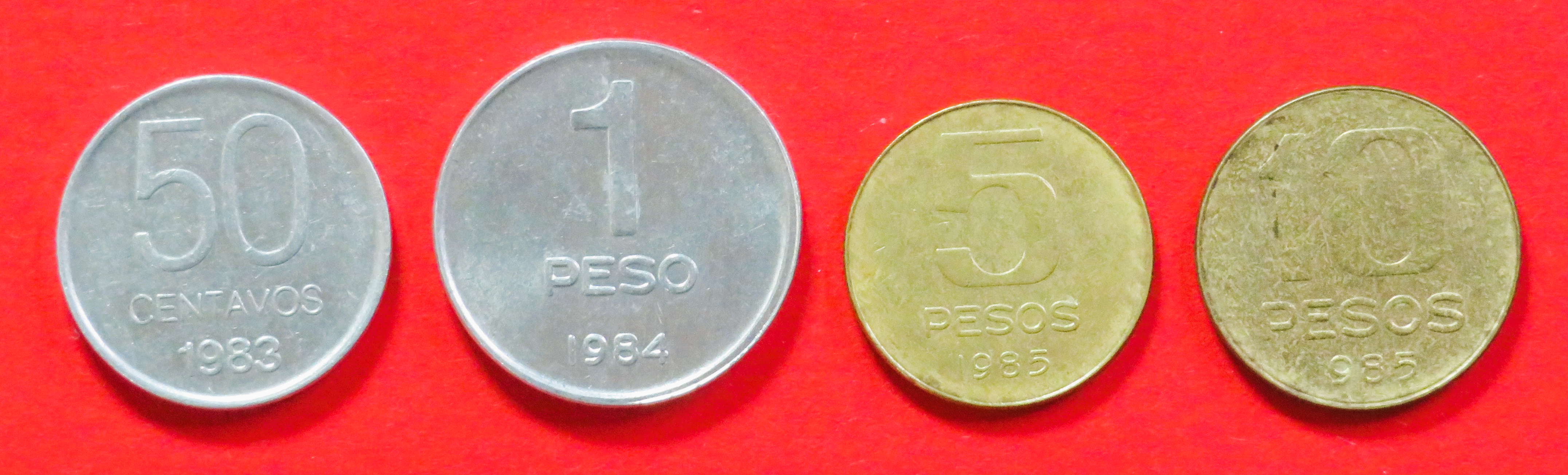 Argentina - Set 11:  50 Centavos + 1/5/10 Pesos, 1983-1985, circulated (used / vf), # 90-93